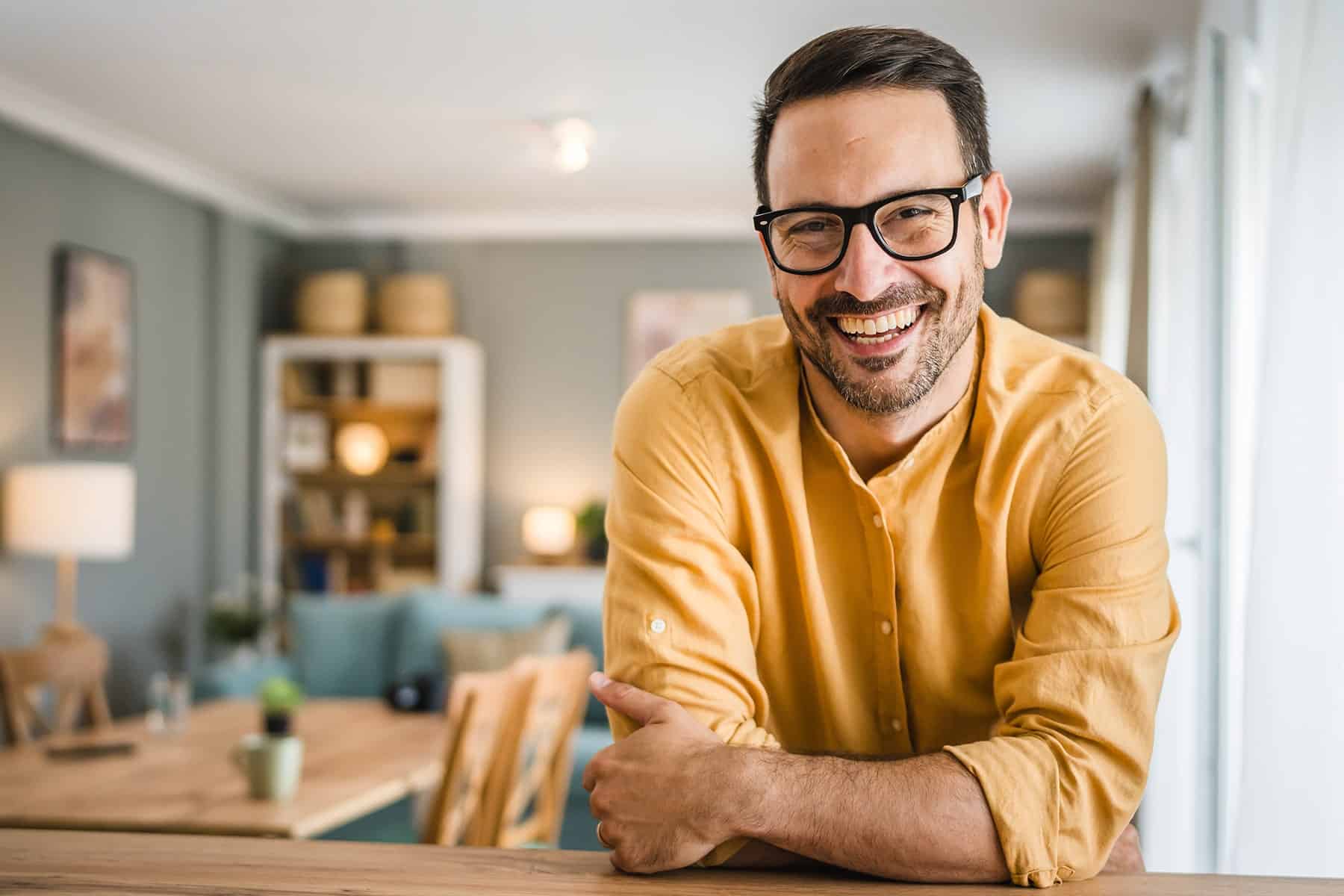 Man smiling after getting orthodontic care in Battle Creek, MI